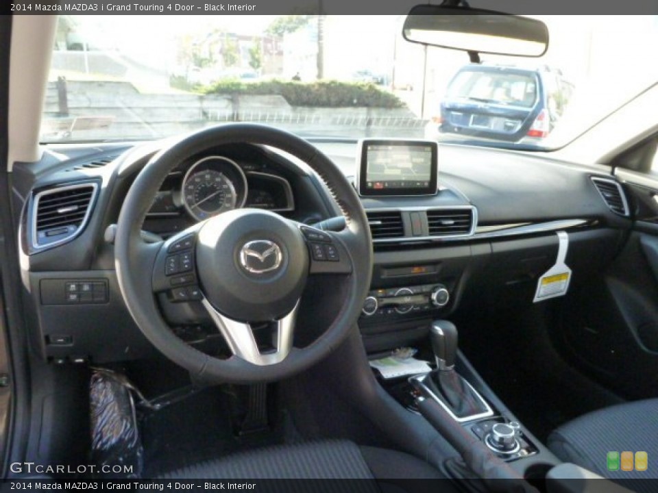 Black Interior Dashboard for the 2014 Mazda MAZDA3 i Grand Touring 4 Door #87254912