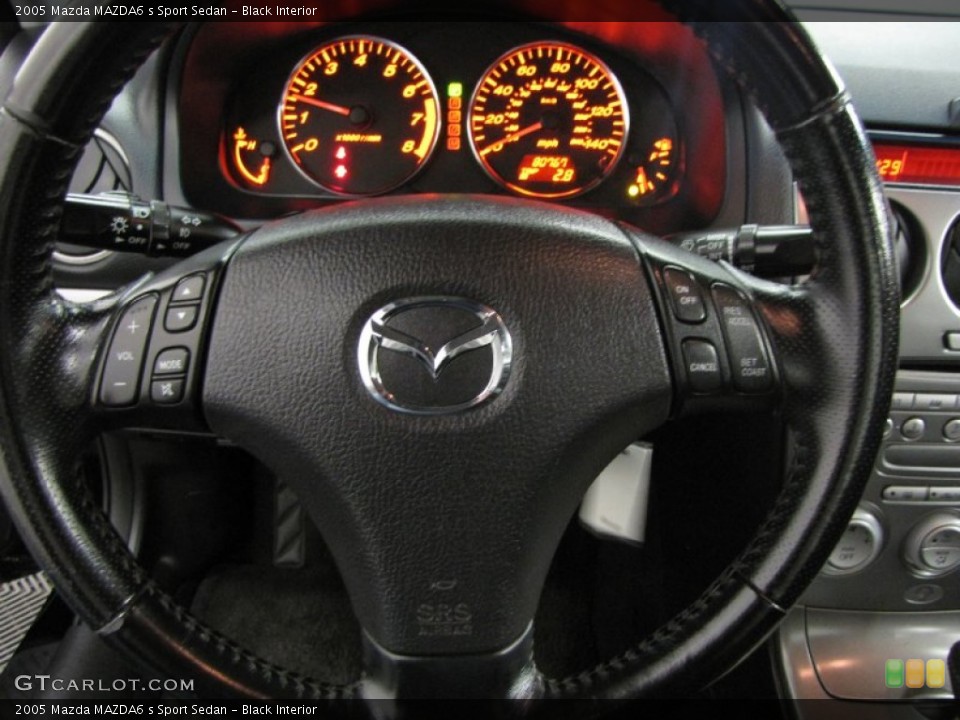 Black Interior Steering Wheel for the 2005 Mazda MAZDA6 s Sport Sedan #87267606