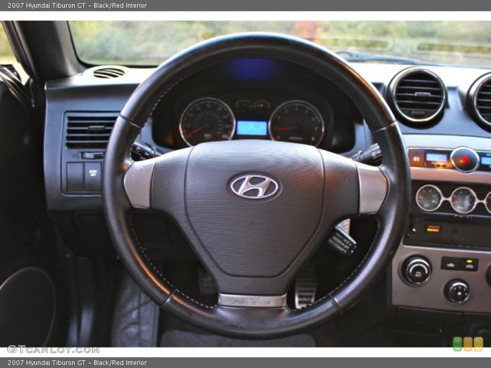 Black/Red Interior Steering Wheel for the 2007 Hyundai Tiburon GT #87315214