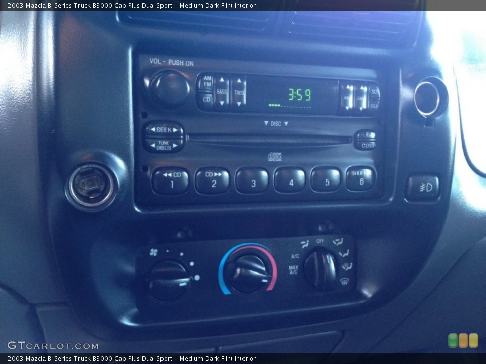 Medium Dark Flint Interior Controls for the 2003 Mazda B-Series Truck B3000 Cab Plus Dual Sport #87350788