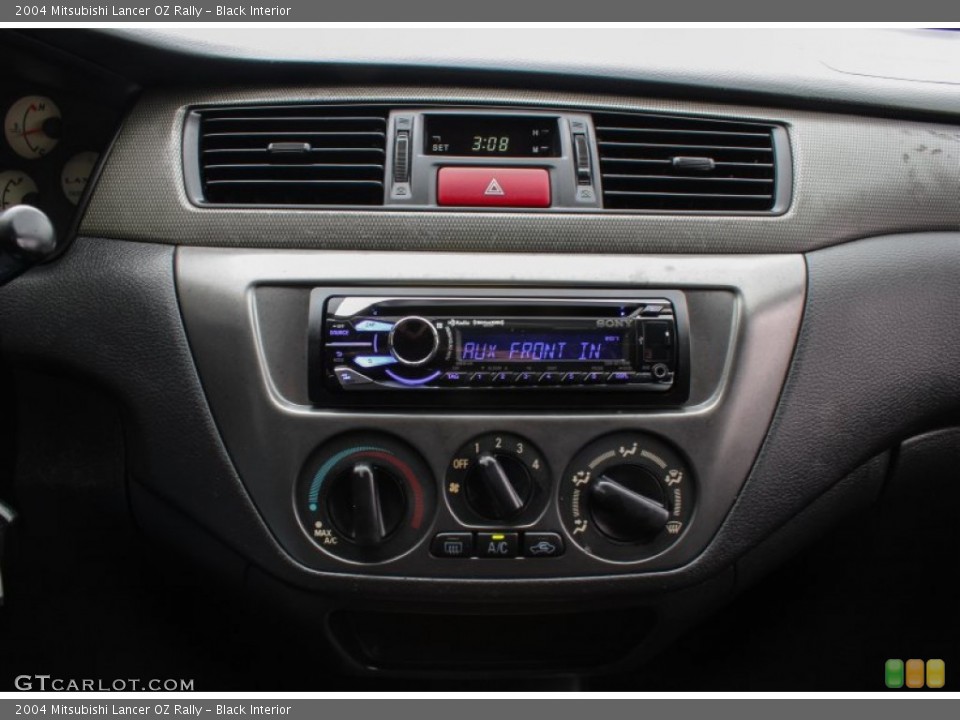 Black Interior Controls for the 2004 Mitsubishi Lancer OZ Rally #87381676