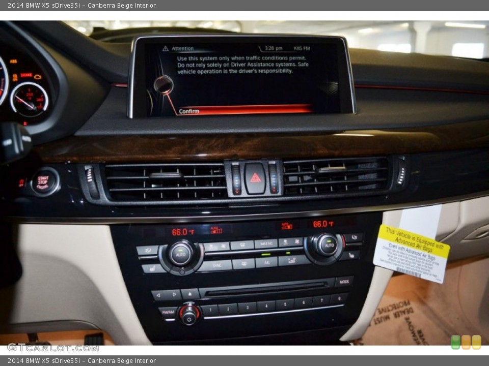 Canberra Beige Interior Controls for the 2014 BMW X5 sDrive35i #87419627