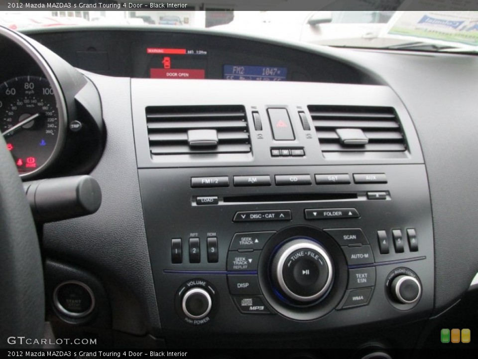Black Interior Controls for the 2012 Mazda MAZDA3 s Grand Touring 4 Door #87438755