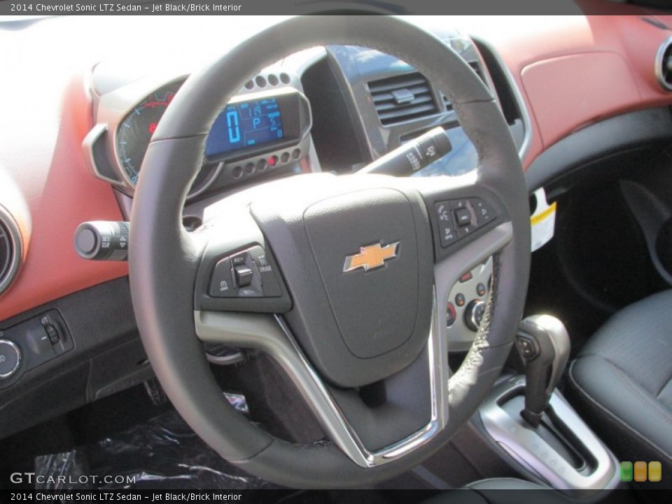 Jet Black/Brick Interior Steering Wheel for the 2014 Chevrolet Sonic LTZ Sedan #87463484