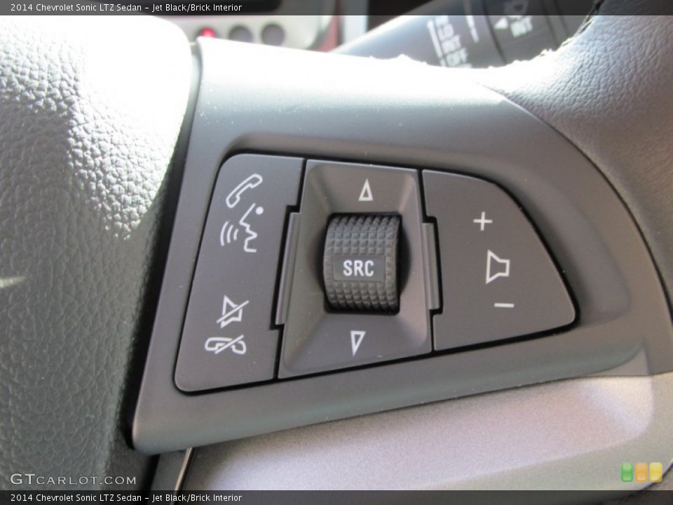 Jet Black/Brick Interior Controls for the 2014 Chevrolet Sonic LTZ Sedan #87463592