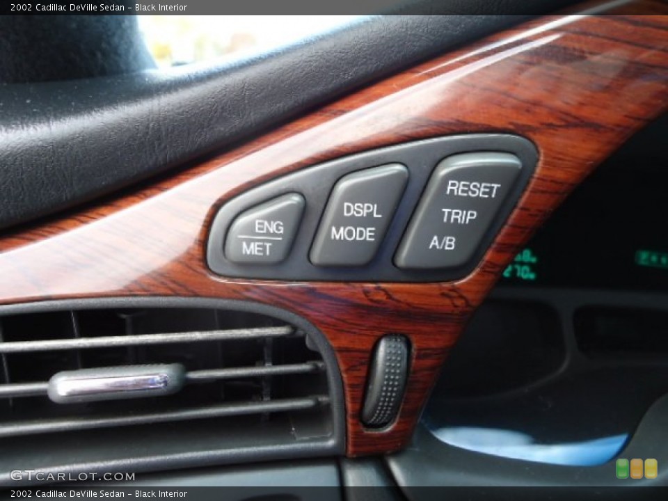 Black Interior Controls for the 2002 Cadillac DeVille Sedan #87506086