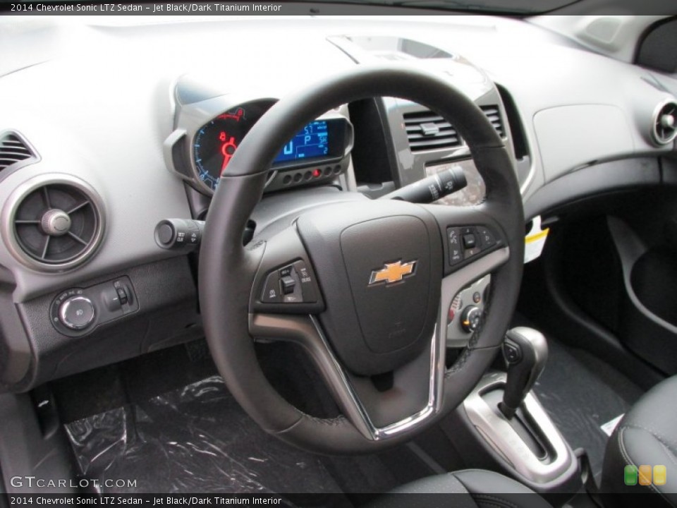 Jet Black/Dark Titanium Interior Steering Wheel for the 2014 Chevrolet Sonic LTZ Sedan #87533293