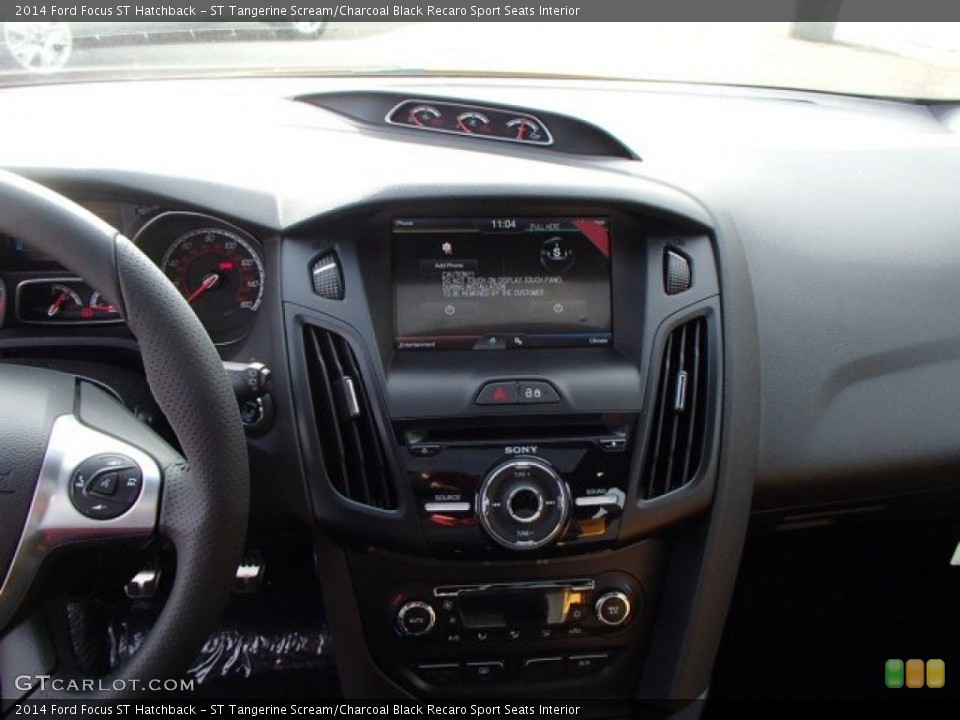 ST Tangerine Scream/Charcoal Black Recaro Sport Seats Interior Controls for the 2014 Ford Focus ST Hatchback #87609586