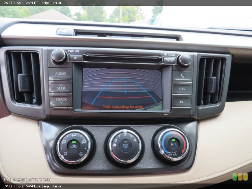 Beige Interior Controls for the 2013 Toyota RAV4 LE #87610231