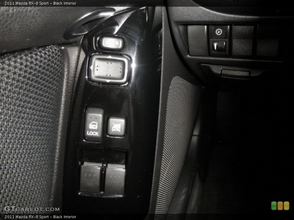 Black Interior Controls for the 2011 Mazda RX-8 Sport #87613084