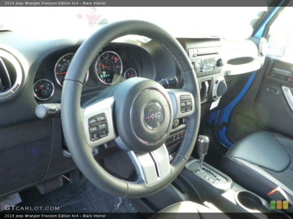 Black Interior Steering Wheel for the 2014 Jeep Wrangler Freedom Edition 4x4 #87613903