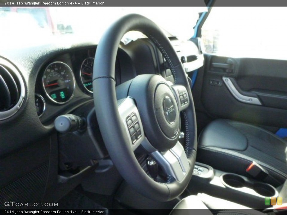 Black Interior Steering Wheel for the 2014 Jeep Wrangler Freedom Edition 4x4 #87613918