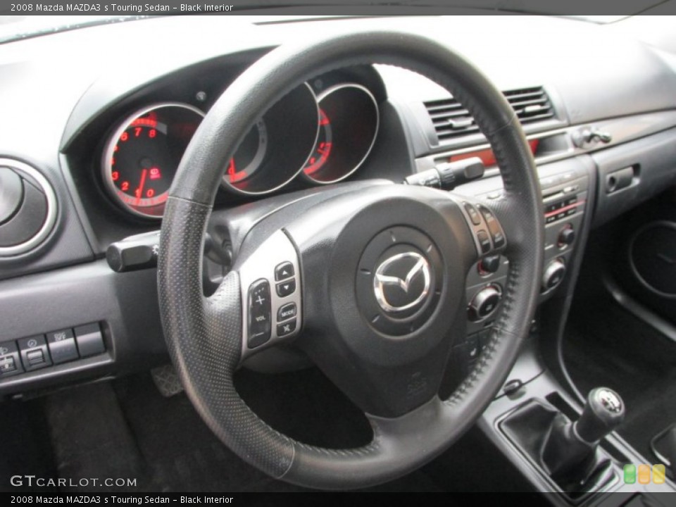 Black Interior Steering Wheel for the 2008 Mazda MAZDA3 s Touring Sedan #87708815