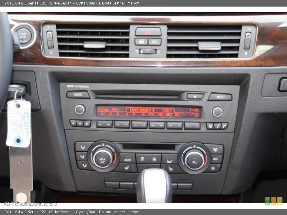 Oyster/Black Dakota Leather Interior Controls for the 2011 BMW 3 Series 328i xDrive Sedan #87722338
