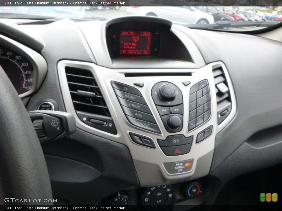 Charcoal Black Leather Interior Controls for the 2013 Ford Fiesta Titanium Hatchback #87723333