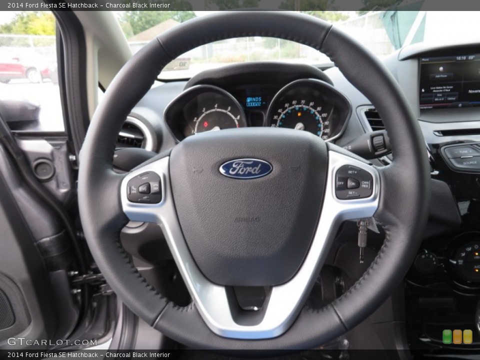Charcoal Black Interior Steering Wheel for the 2014 Ford Fiesta SE Hatchback #87742713