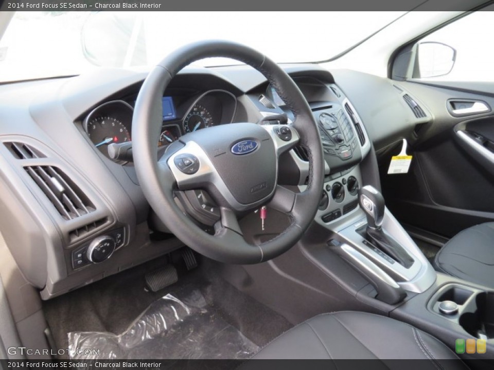 Charcoal Black Interior Prime Interior for the 2014 Ford Focus SE Sedan #87743418