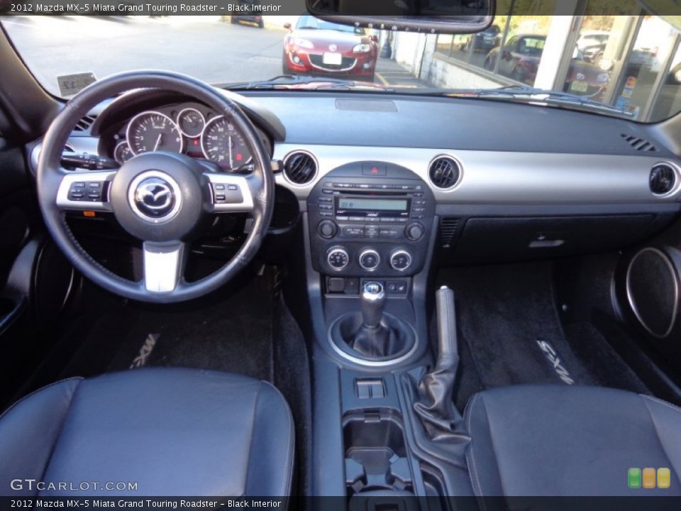 Black Interior Dashboard for the 2012 Mazda MX-5 Miata Grand Touring Roadster #87869113