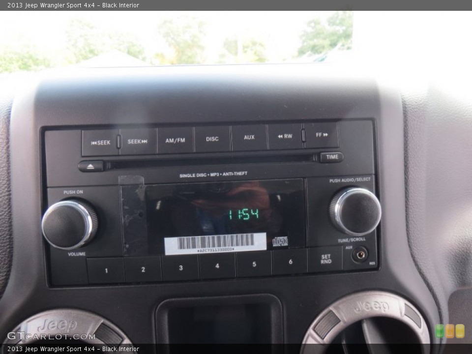 Black Interior Audio System for the 2013 Jeep Wrangler Sport 4x4 #88049327