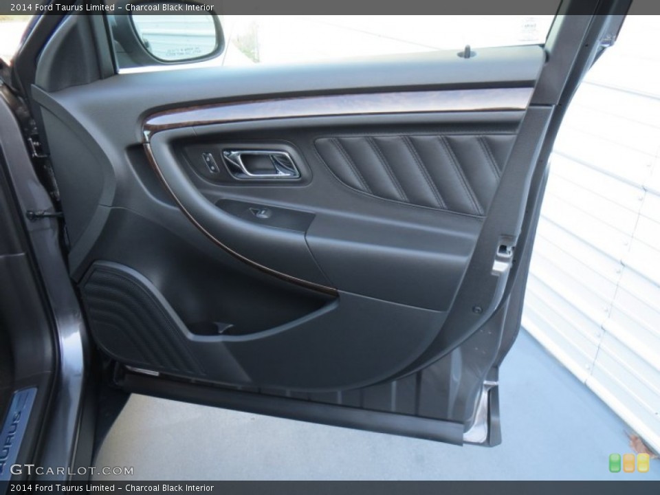 Charcoal Black Interior Door Panel for the 2014 Ford Taurus Limited #88075374
