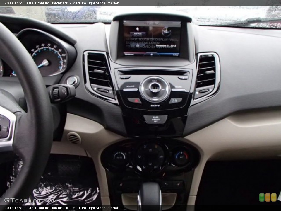 Medium Light Stone Interior Controls for the 2014 Ford Fiesta Titanium Hatchback #88133204