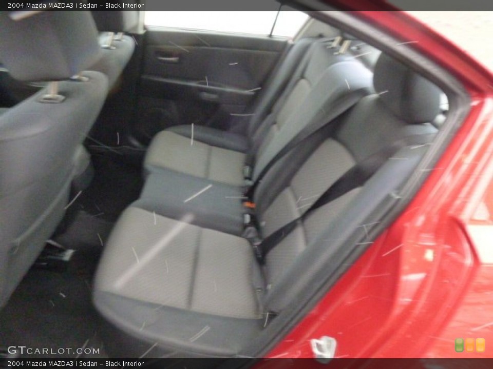 Black Interior Rear Seat for the 2004 Mazda MAZDA3 i Sedan #88287006