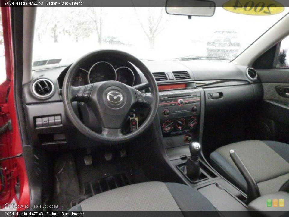 Black Interior Prime Interior for the 2004 Mazda MAZDA3 i Sedan #88287039