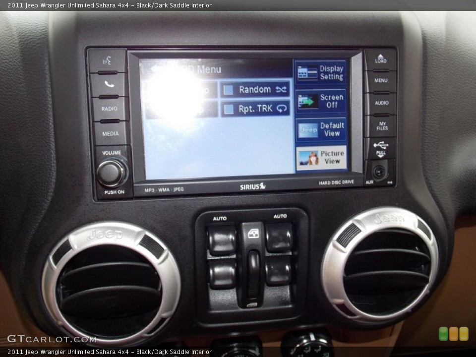Black/Dark Saddle Interior Controls for the 2011 Jeep Wrangler Unlimited Sahara 4x4 #88294346