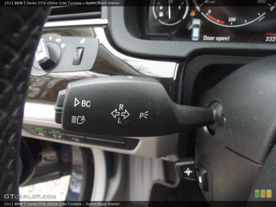 Oyster/Black Interior Controls for the 2011 BMW 5 Series 550i xDrive Gran Turismo #88297347