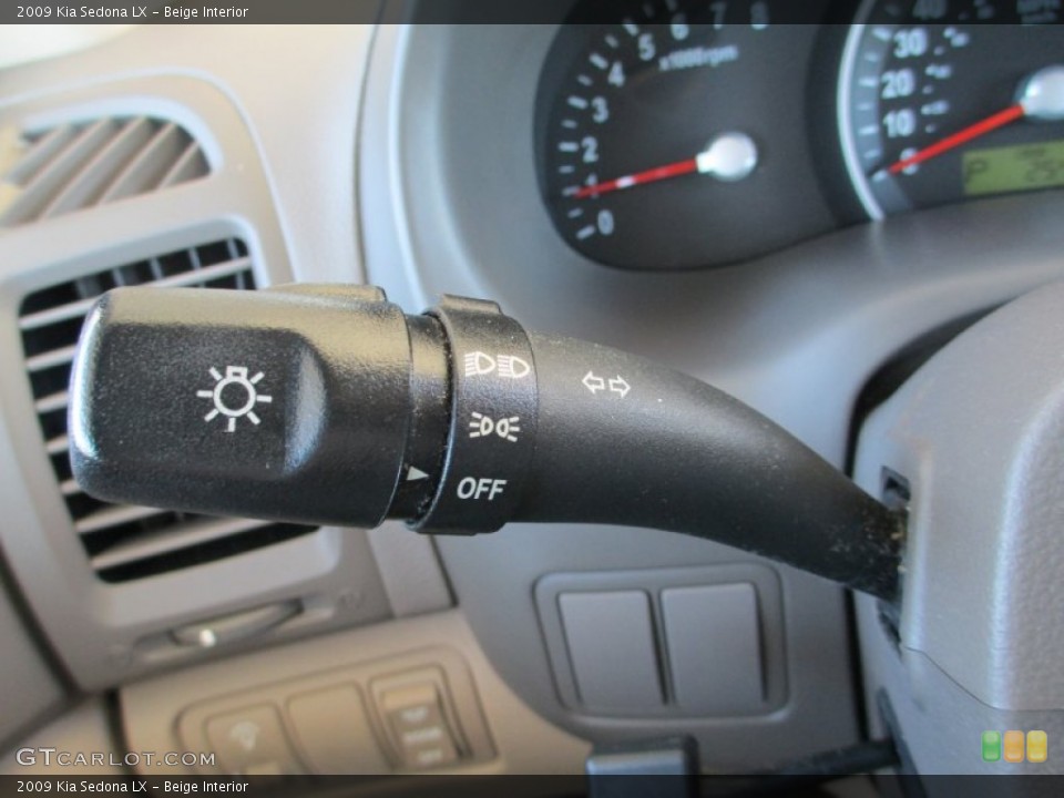 Beige Interior Controls for the 2009 Kia Sedona LX #88370980