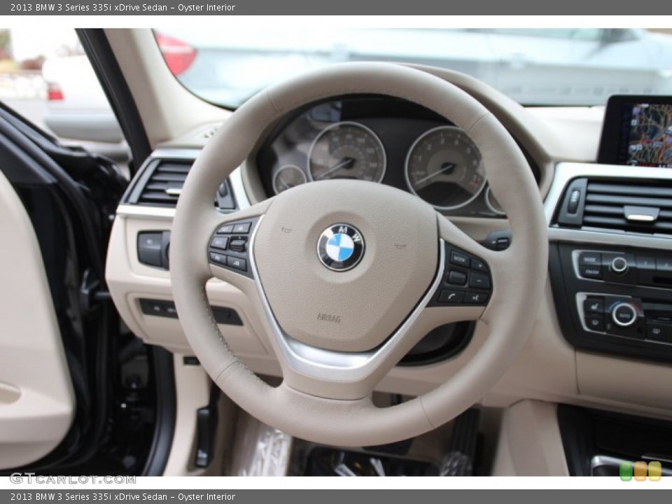Oyster Interior Steering Wheel for the 2013 BMW 3 Series 335i xDrive Sedan #88412825