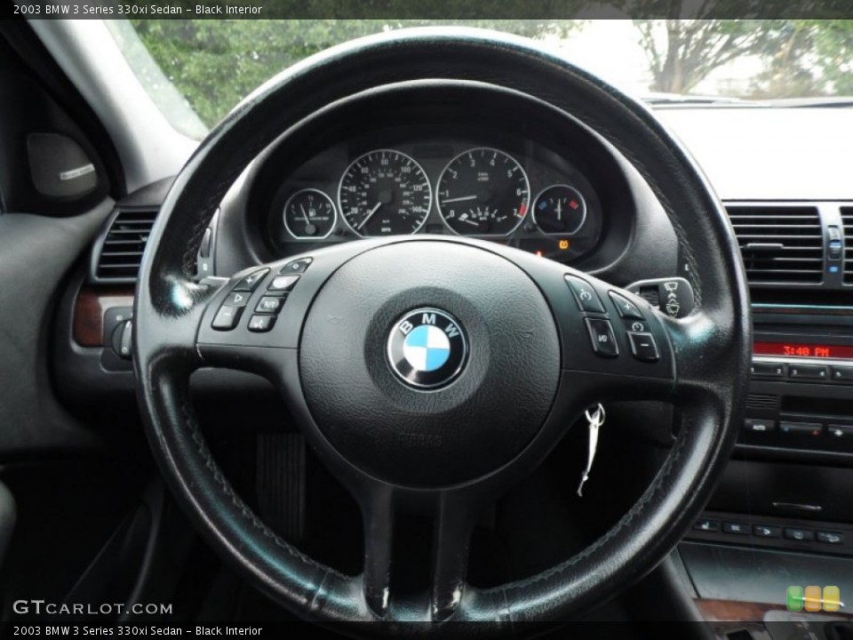 Black Interior Steering Wheel for the 2003 BMW 3 Series 330xi Sedan #88546172