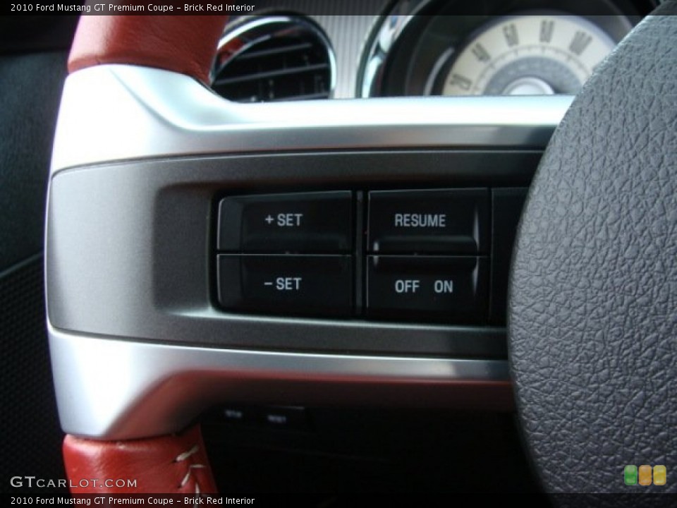 Brick Red Interior Controls for the 2010 Ford Mustang GT Premium Coupe #88555985