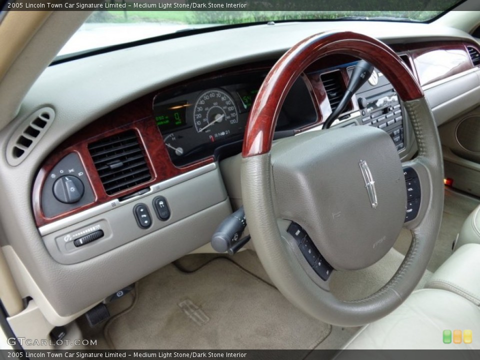 Medium Light Stone/Dark Stone Interior Steering Wheel for the 2005 Lincoln Town Car Signature Limited #88625659