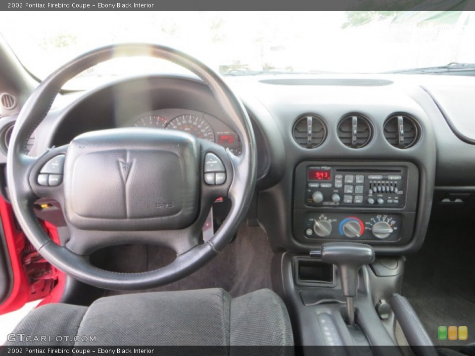 Ebony Black Interior Dashboard for the 2002 Pontiac Firebird Coupe #88772126