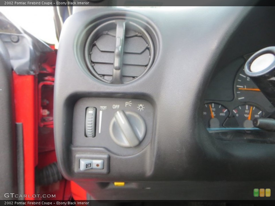 Ebony Black Interior Controls for the 2002 Pontiac Firebird Coupe #88772288