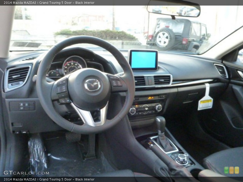Black Interior Dashboard for the 2014 Mazda MAZDA3 i Grand Touring 5 Door #88875246