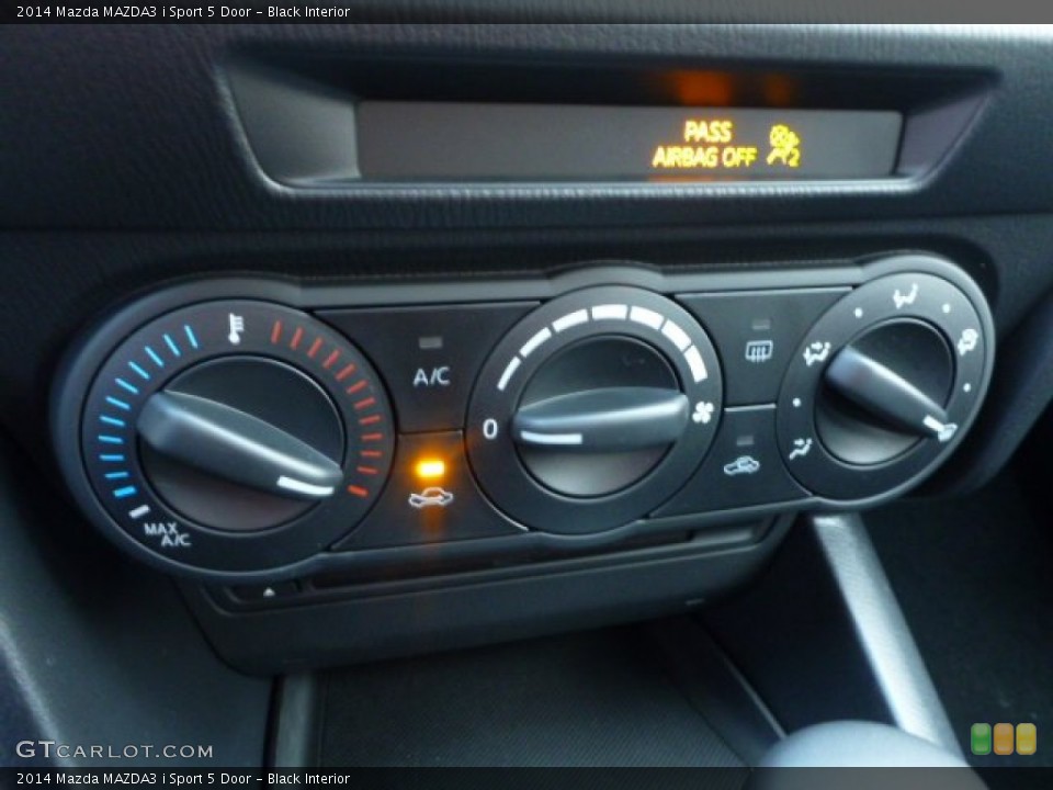 Black Interior Controls for the 2014 Mazda MAZDA3 i Sport 5 Door #88875702