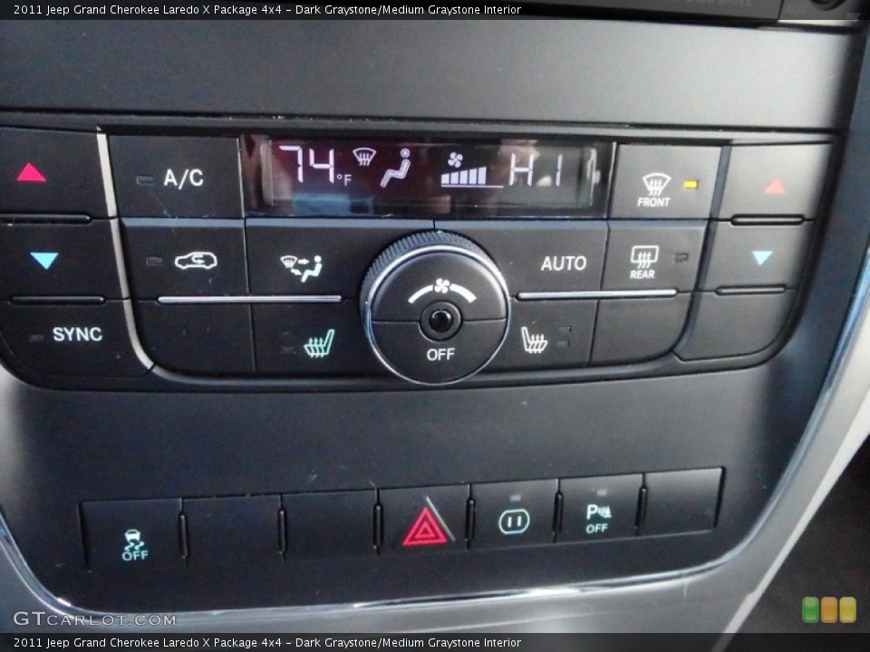 Dark Graystone/Medium Graystone Interior Controls for the 2011 Jeep Grand Cherokee Laredo X Package 4x4 #88944803