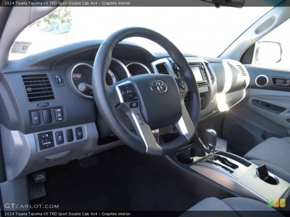Graphite Interior Dashboard for the 2014 Toyota Tacoma V6 TRD Sport Double Cab 4x4 #89050551