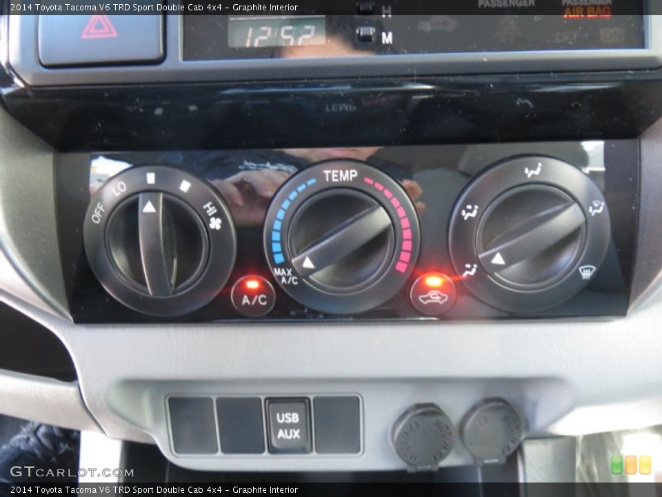 Graphite Interior Controls for the 2014 Toyota Tacoma V6 TRD Sport Double Cab 4x4 #89050566