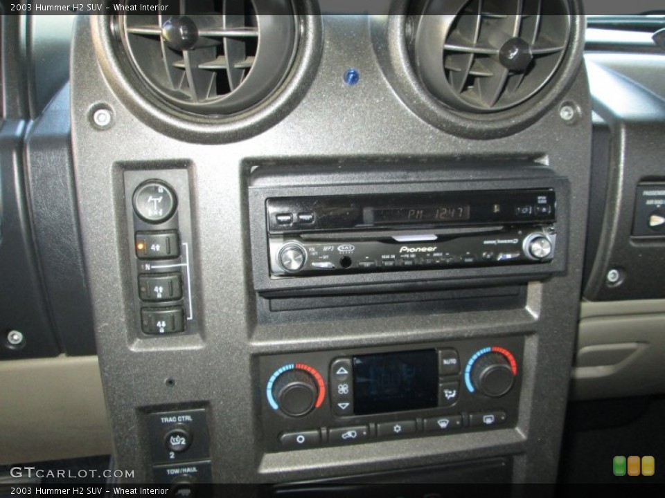 Wheat Interior Controls for the 2003 Hummer H2 SUV #89169499