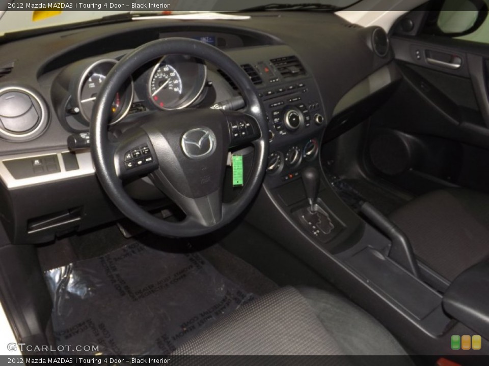 Black Interior Prime Interior for the 2012 Mazda MAZDA3 i Touring 4 Door #89178250