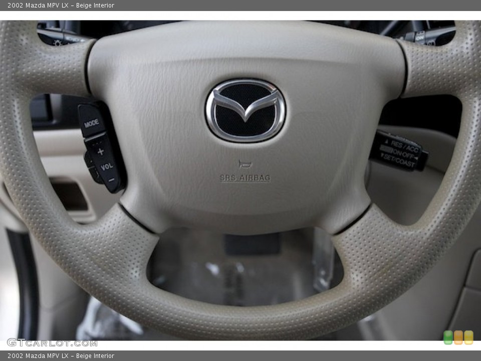 Beige Interior Steering Wheel for the 2002 Mazda MPV LX #89187499