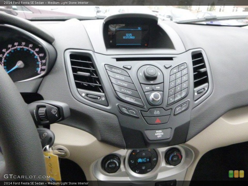 Medium Light Stone Interior Controls for the 2014 Ford Fiesta SE Sedan #89216542