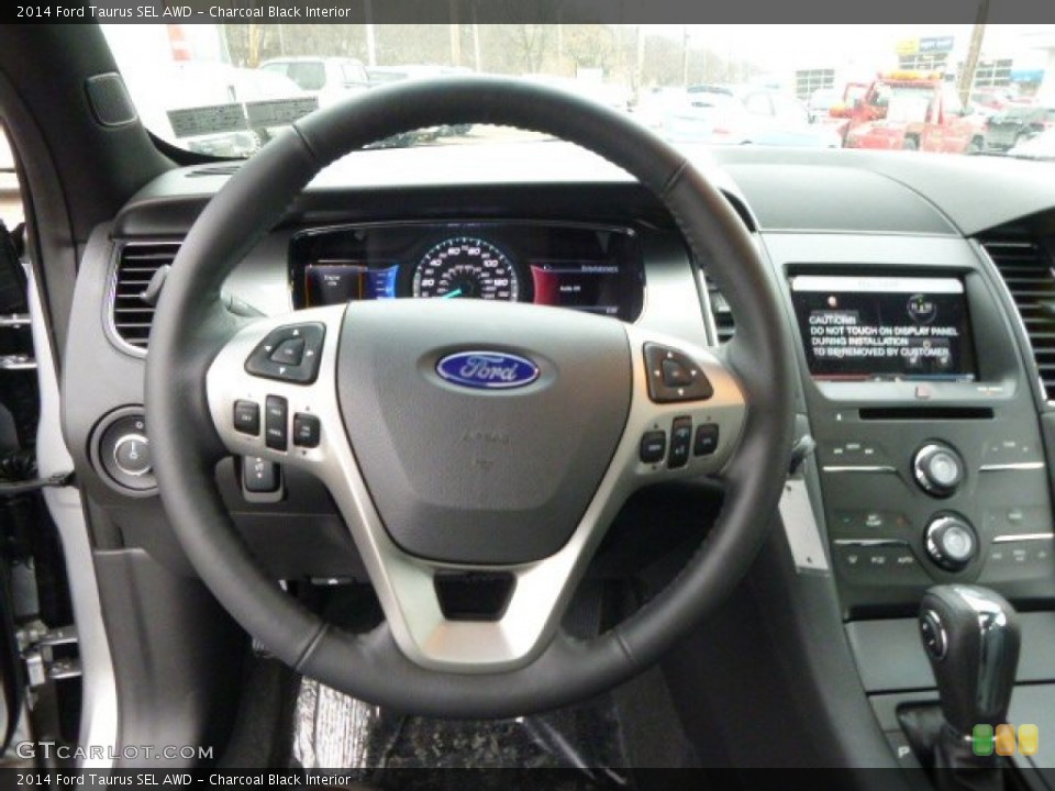 Charcoal Black Interior Steering Wheel for the 2014 Ford Taurus SEL AWD #89282876