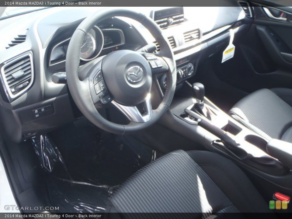 Black Interior Prime Interior for the 2014 Mazda MAZDA3 i Touring 4 Door #89359912