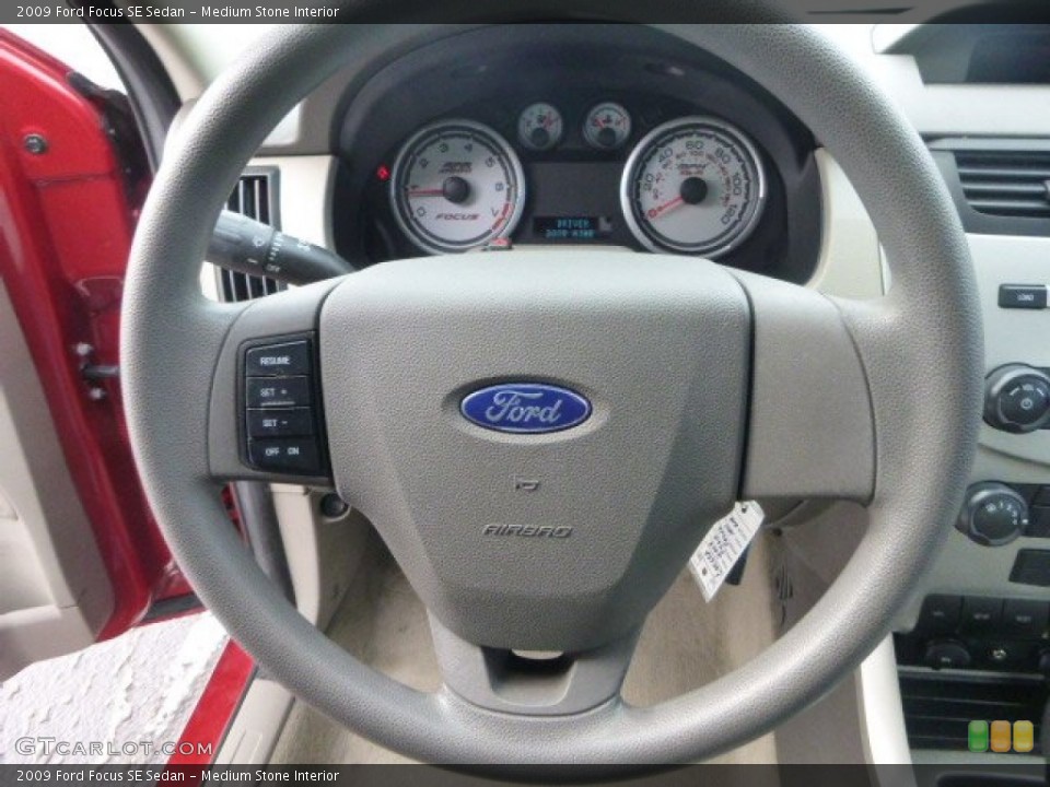 Medium Stone Interior Steering Wheel for the 2009 Ford Focus SE Sedan #89520040