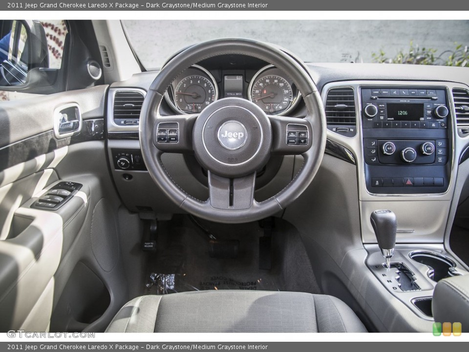 Dark Graystone/Medium Graystone Interior Dashboard for the 2011 Jeep Grand Cherokee Laredo X Package #89521549