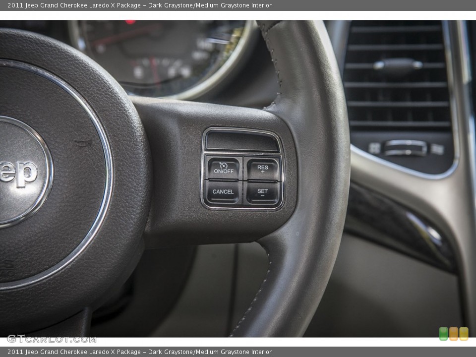 Dark Graystone/Medium Graystone Interior Controls for the 2011 Jeep Grand Cherokee Laredo X Package #89522032